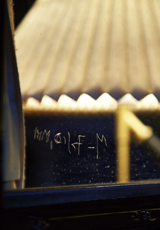 Prior to relinquishing the royal carriage to the Danish Railway Museum in 2001, HM Queen Margrethe II scratched her name on the window in her sleeping compartment